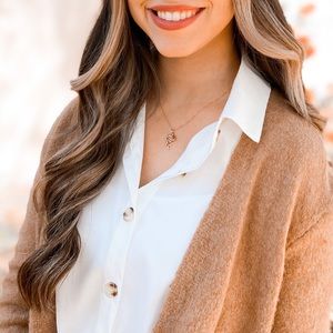 White button down with tortoise buttons